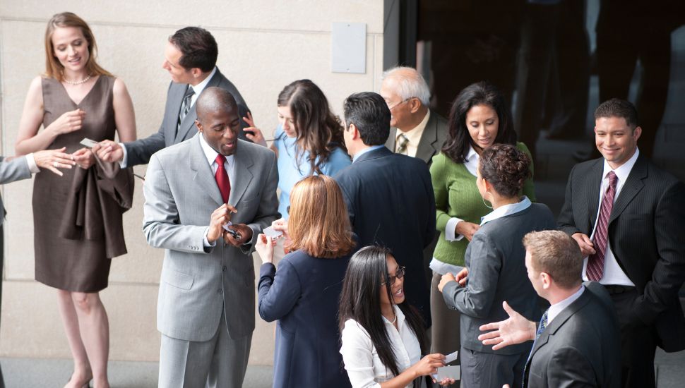 People engaging in holiday networking at the Great Careers Network